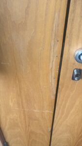 Example of visible damage to the door leaf and its edge lipping
